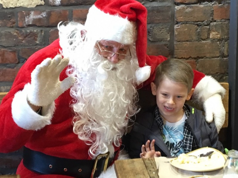 Father Christmas calls in for breakfast surprise at Marshalls Yard